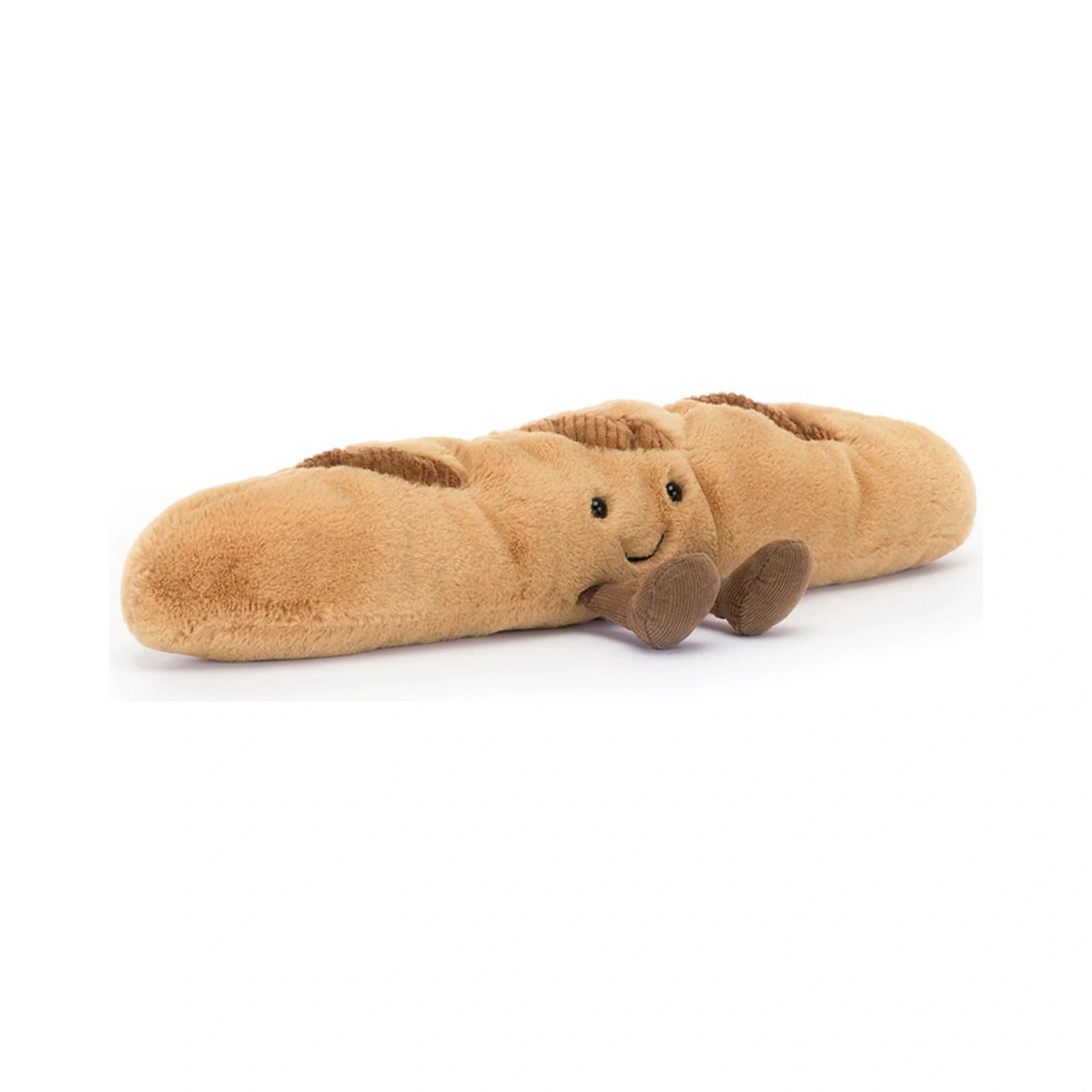 A golden brown Jellycat Amuseables Baguette plush toy features a smiling face, beaded eyes, textured crust details, and small brown corduroy feet lying flat on a plain white background.