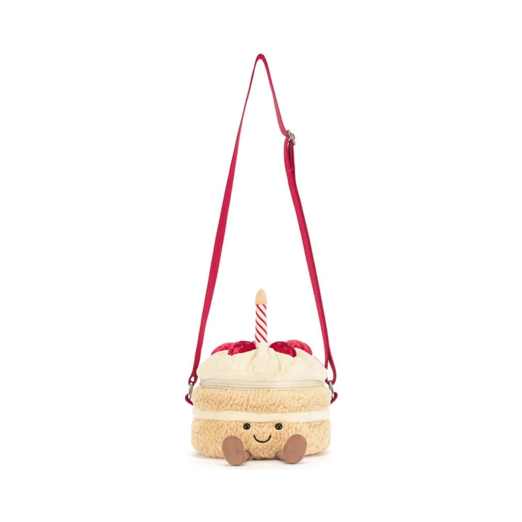 Jellycat Amuseables Birthday Cake Bag 18cm featuring an embroidered smile, plush icing, and corduroy boots.