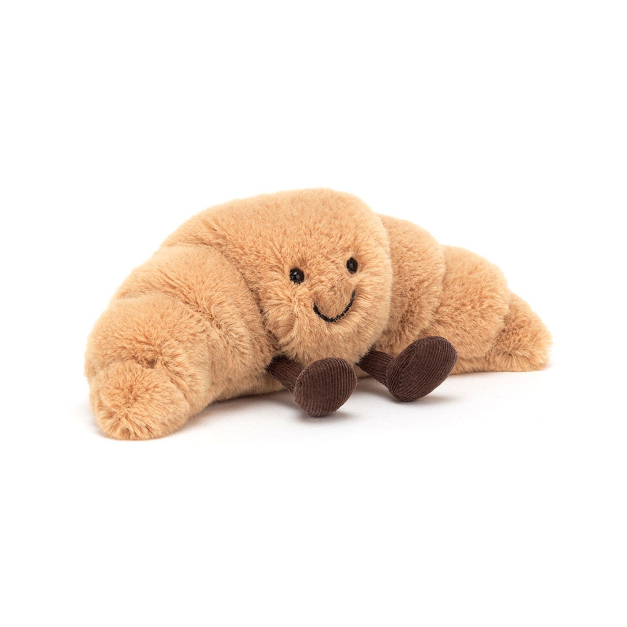 22cm Jellycat Amuseables Croissant soft toy featuring golden-brown crescent-shaped plush pastry, a sweet smiling face, and brown cordy legs.