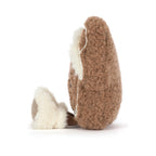 Side view of Jellycat Amuseables Molasi Cookie showing fluffy cream white shearling trim.