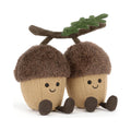 Jellycat Amuseables Acorns plush toy with smiling faces, brown fur caps, corduroy feet, and green leaf on white background.