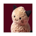 Jellycat Amuseables Peanut Cat Outfit showing red background close up face.