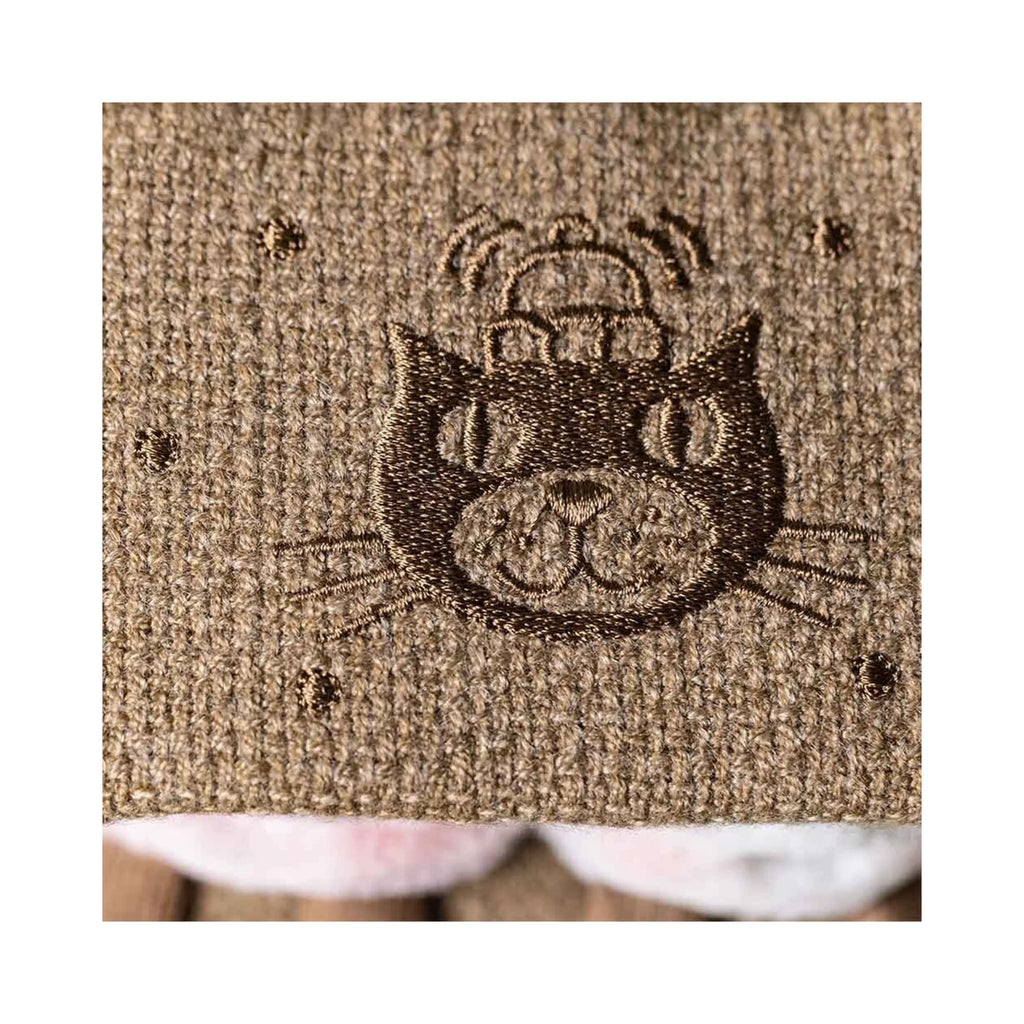 Close up detail of Jellycat Amuseables Smores showing brown waffle knit plush and an intricate embroidered cat face.