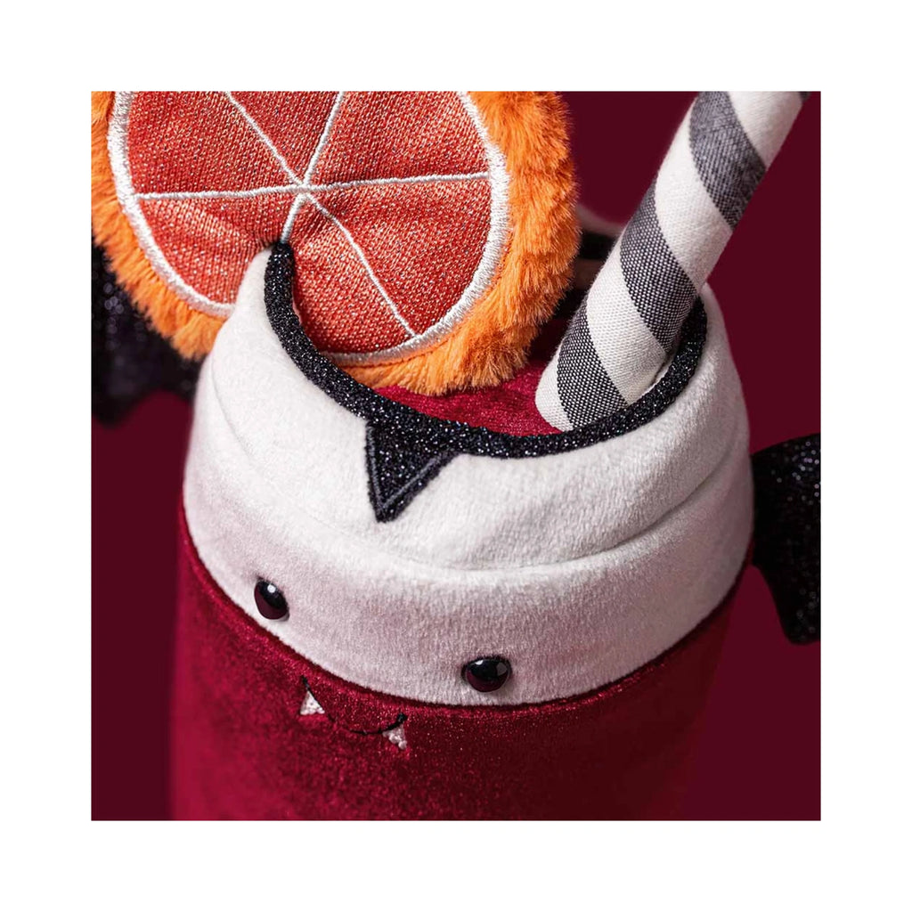 Close up detail of Jellycat Amuseables Vampop Drink showing orange plush fruit slice and striped straw.