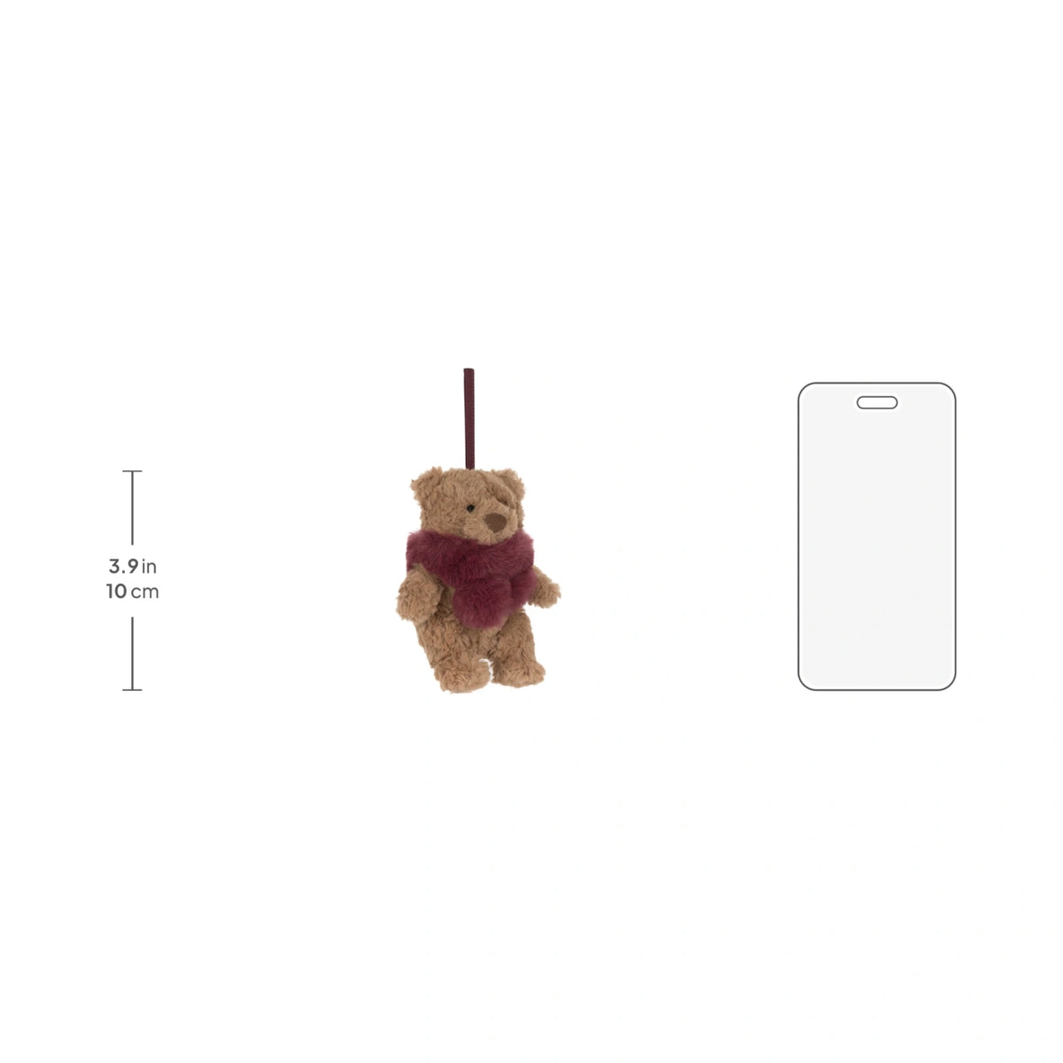Scale reference of Jellycat Bartholomew Bear Winter Warmer Decoration next to measuring guide reference.