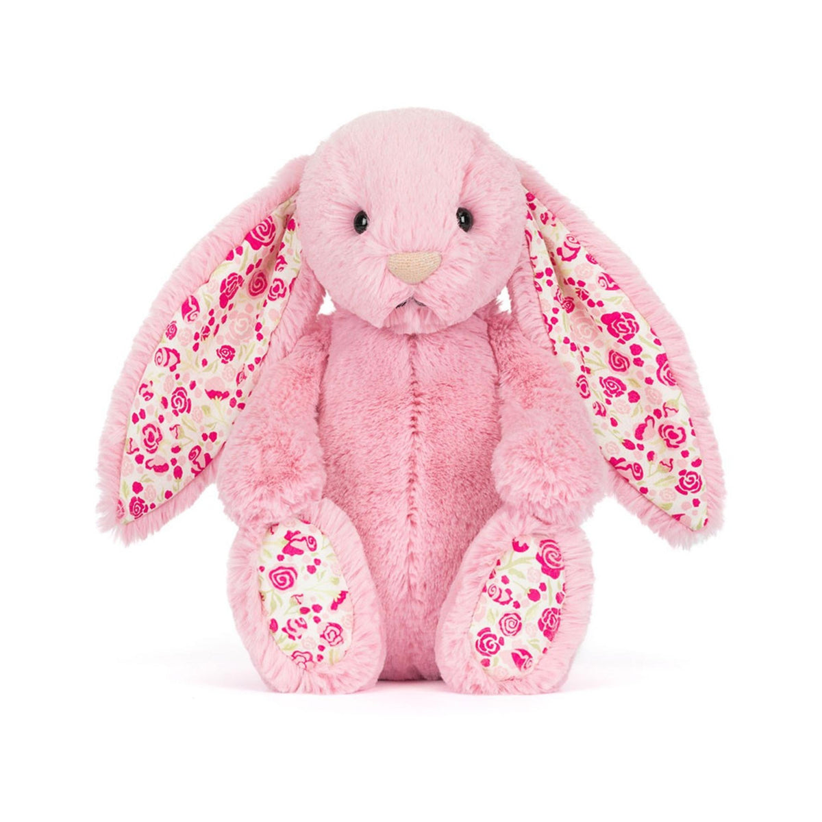 Original 31 cm Jellycat Blushkin Blossom Luxe Bunny featuring extraordinarily voluminous blush-pink faux fur, long floppy ears lined with delicate woven floral cotton, and a sparkling metallic thread nose.