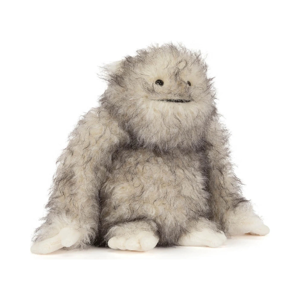 Front view of Jellycat Bretti Yeti showing fluffy grey and white plush fur and a smiling embroidered expression.