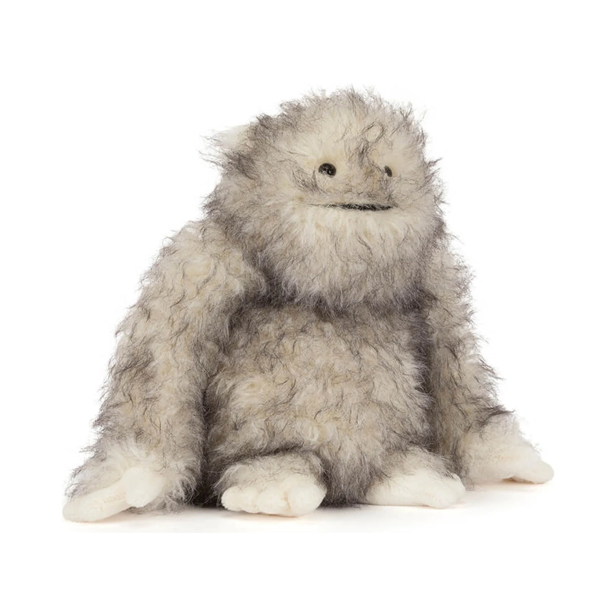 Front view of Jellycat Bretti Yeti showing fluffy grey and white plush fur and a smiling embroidered expression.