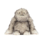 Front view of Jellycat Bretti Yeti showing fluffy grey and white plush fur and smiling embroidered face.