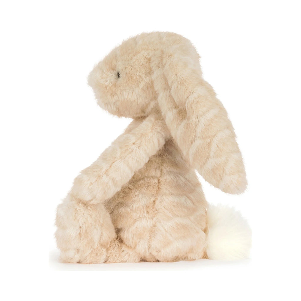 Side view of Jellycat Franilla Luxe Bunny showing fluffy beige faux fur.