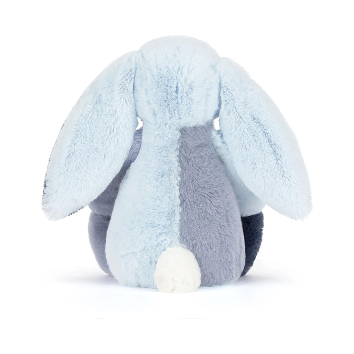 Back view of the Jellycat Puddlesea Bunny Original plush toy showing its soft patchwork fur in shades of light blue and grey with a small fluffy white tail.
