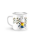 Mug with a rabbit character riding a bicycle and flowers design on a white background