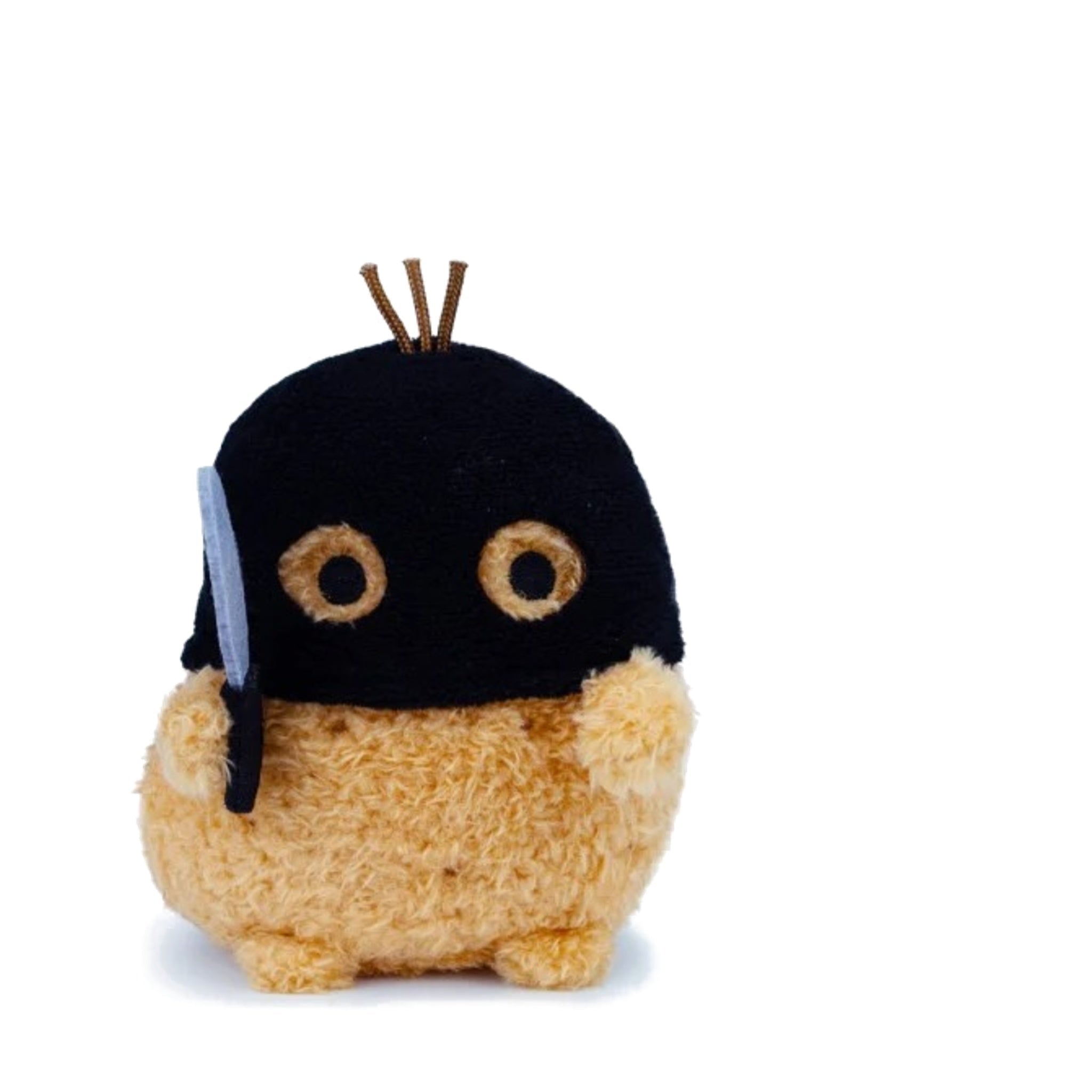 Plush toy resembling a character with a black headband on a white background