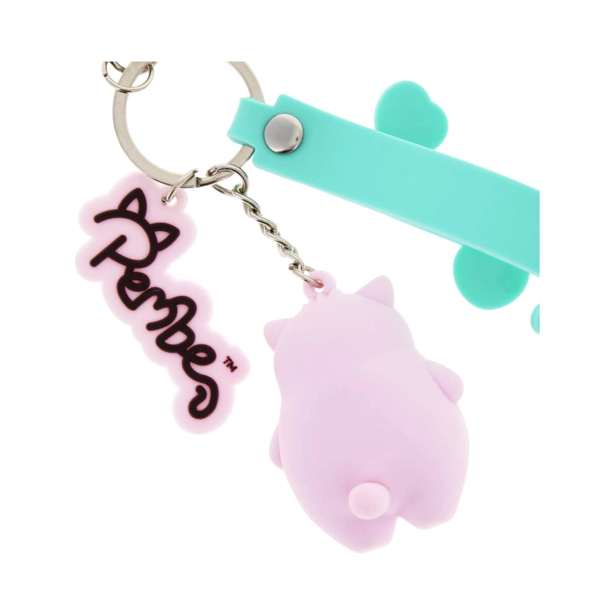 Pembe Keyring featuring a light pink cat character charm a mint green silicone strap with pink You Be You text and a pink Pembe script logo tag on a silver metal keyring.