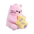 Pembe the Pink Cat laughing pembe small soft toy features a happy pink plush cat holding a yellow star with HA HA embroidered on it.
