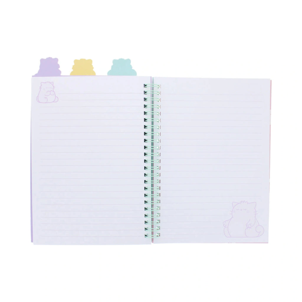 An open Pembe the Pink Cat PEMBE PROJECT BOOK displaying lined pages with lavender cat illustrations in the corners, bound by a light green spiral wire and topped with pastel purple, yellow, and blue cat shaped divider tabs.