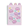 Pembe Project Book featuring a light pink cover adorned with cute pink cat face illustrations, pastel hearts, stars, and motivational text, with three colorful cat shaped tabs protruding from the top and a mint green spiral binding.