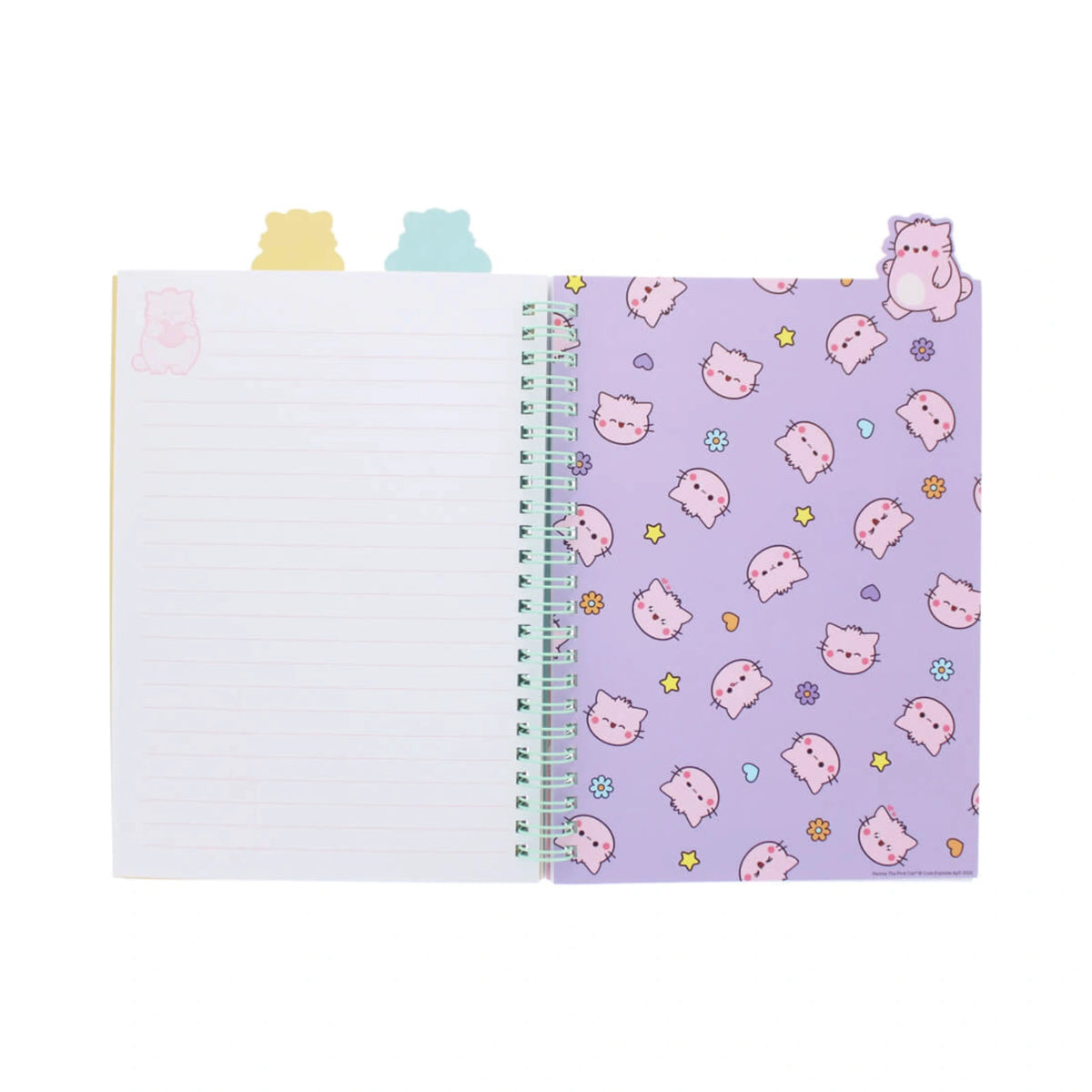 An open Pembe Project Book from Pembe the Pink Cat showing a lined white page on the left and a lavender purple divider page decorated with a pattern of cartoon cat heads, small stars, and flowers with pastel colored cat shaped tabs sticking out from the top.
