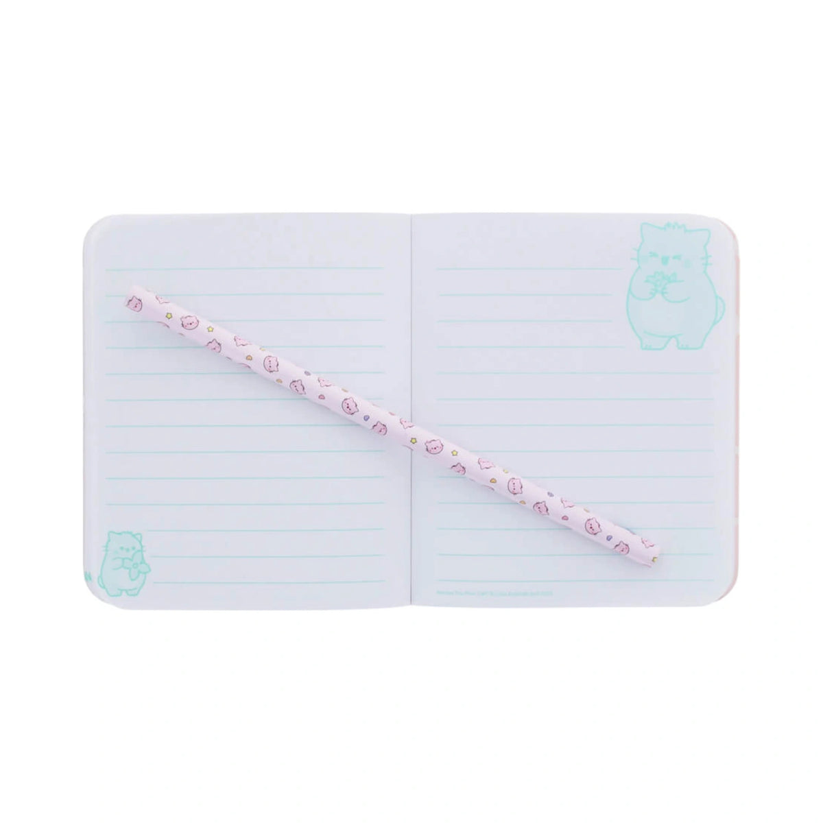 An open lined journal from the Pembe the Pink Cat stationery set featuring light green lines and cute mint cat illustrations in the corners, with a matching pink pencil decorated with small pink cat faces lying diagonally across the pages.