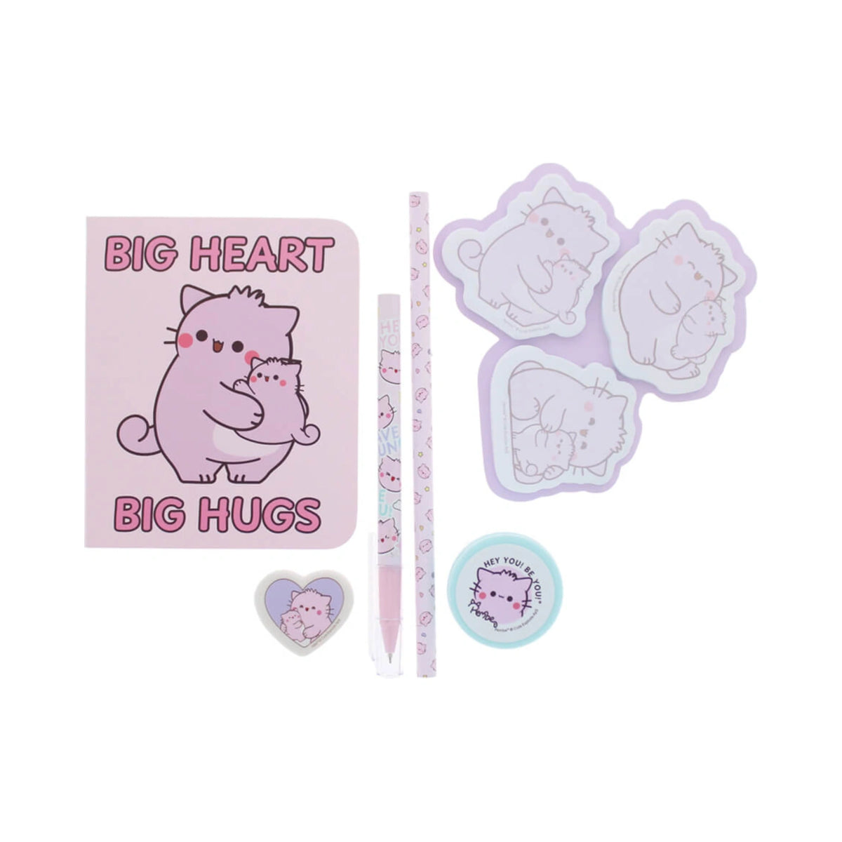 The Pembe Stationery Set features a light pink notebook with a cartoon cat illustration and the words Big Heart Big Hugs, accompanied by matching pastel purple cat shaped sticky notes, a heart shaped eraser, a pink pen, a patterned pencil, and a round mint green sharpener.