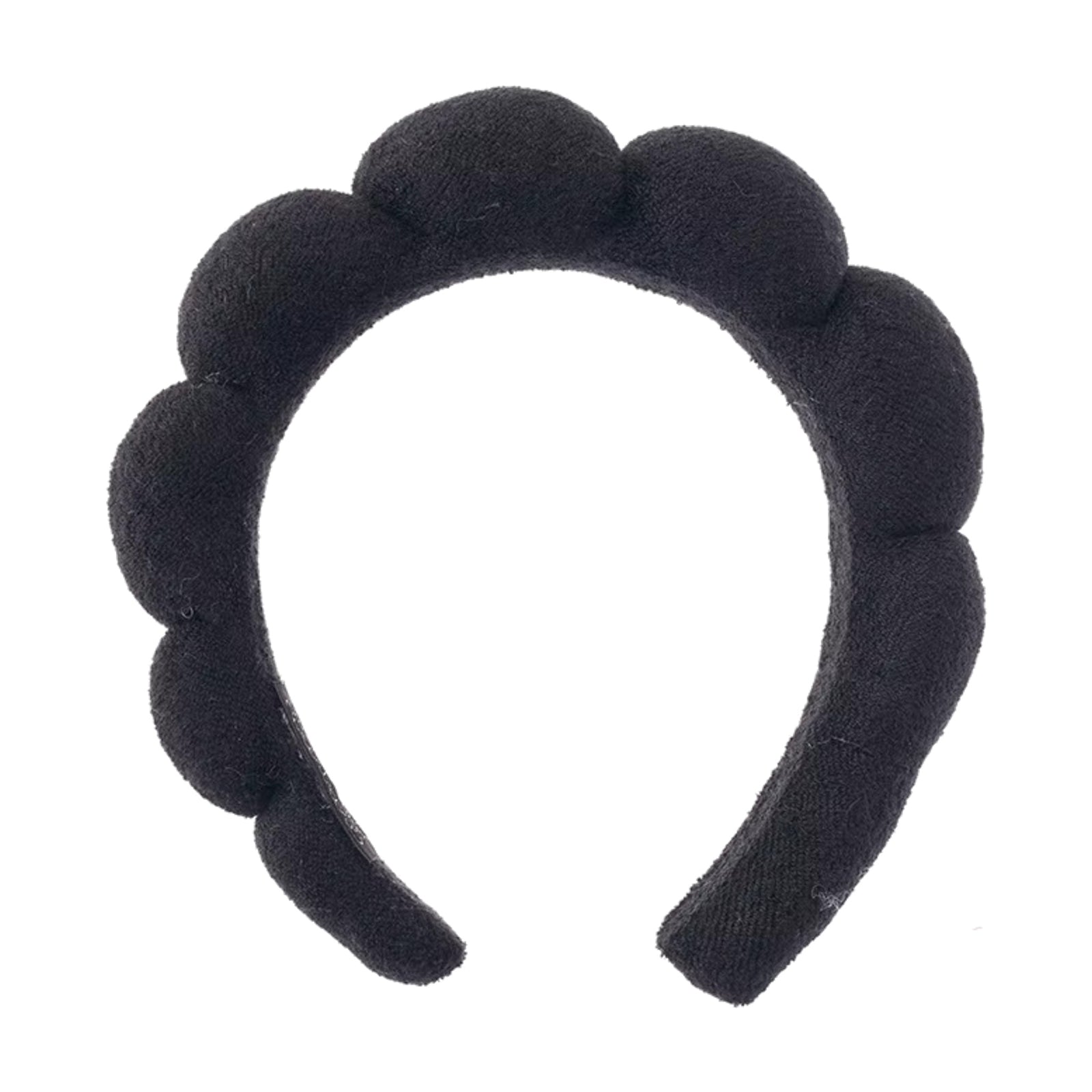 Black headband with raised circular design on a white background