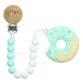 Glitter & Spice Donut Silicone Teether with Pacifier Clip - Tutti Frutti Glitter & Spice Donut Silicone Teether with Pacifier Clip - Tutti Frutti 