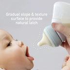 Marcus & Marcus Silicone Angled Feeding Bottle & Spoon Marcus & Marcus Silicone Angled Feeding Bottle & Spoon 
