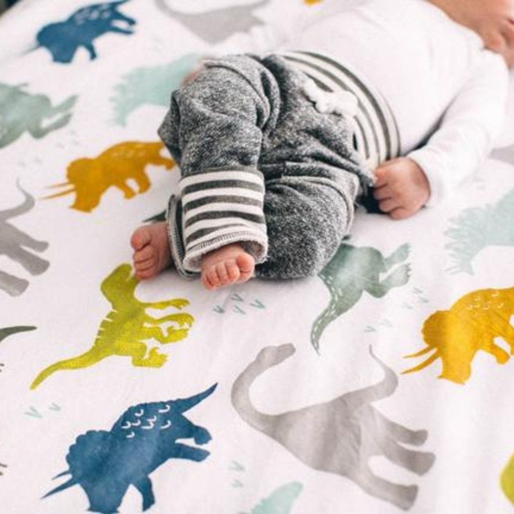 Little Unicorn Cotton Muslin Fitted Cot Sheet - Dino Friends Little Unicorn Cotton Muslin Fitted Cot Sheet - Dino Friends 