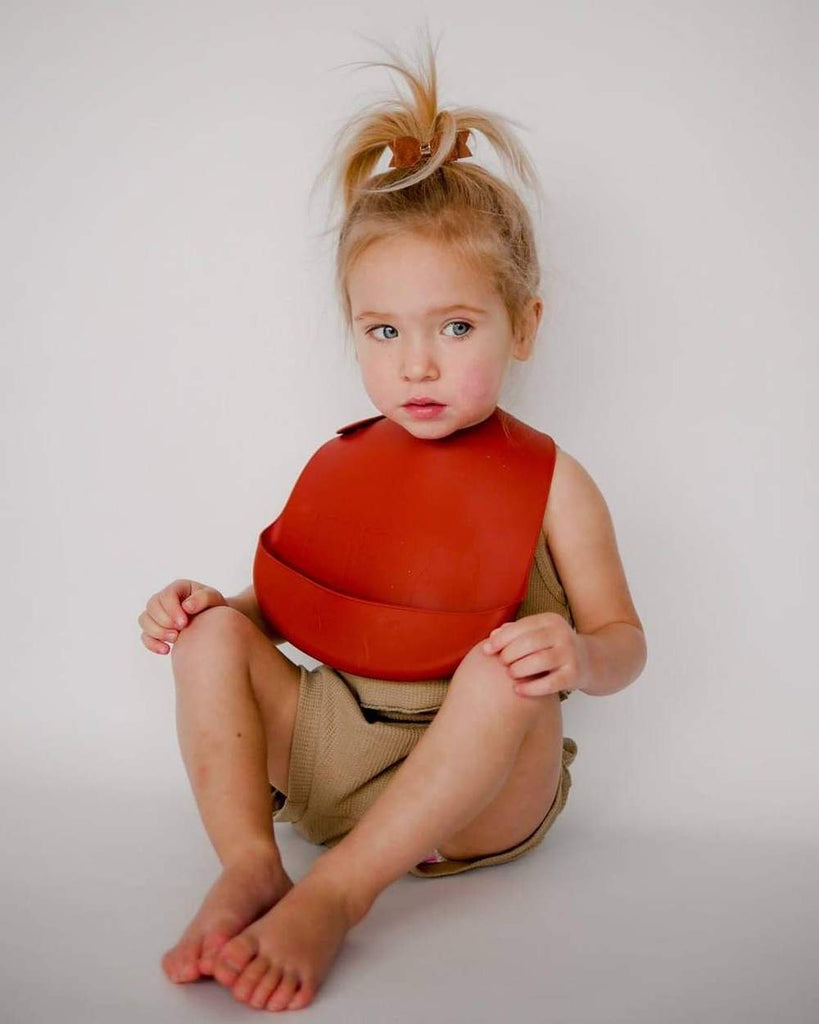 We Might Be Tiny Silicone Catchie Silicone Bibs, Set of 2 - Rust + Beige We Might Be Tiny Silicone Catchie Silicone Bibs, Set of 2 - Rust + Beige 